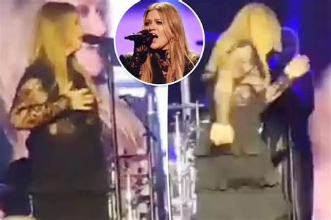 kelly clarkson bikini|Kelly Clarkson ran off stage after her breast was .